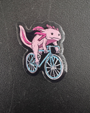 Axolotl on a Bike Enamel Pin