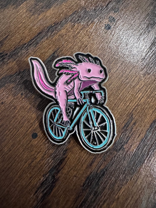 Axolotl on a Bike Enamel Pin