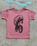 Manatee on a Bicycle Kids T-Shirt