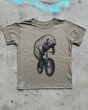 Manatee on a Bicycle Kids T-Shirt