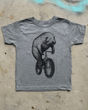 Manatee on a Bicycle Kids T-Shirt