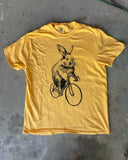 Bunny Rabbit on a Bicycle Men’s T-Shirt - Garment Dyed - Sunshine Yellow / XS - Unisex Tees