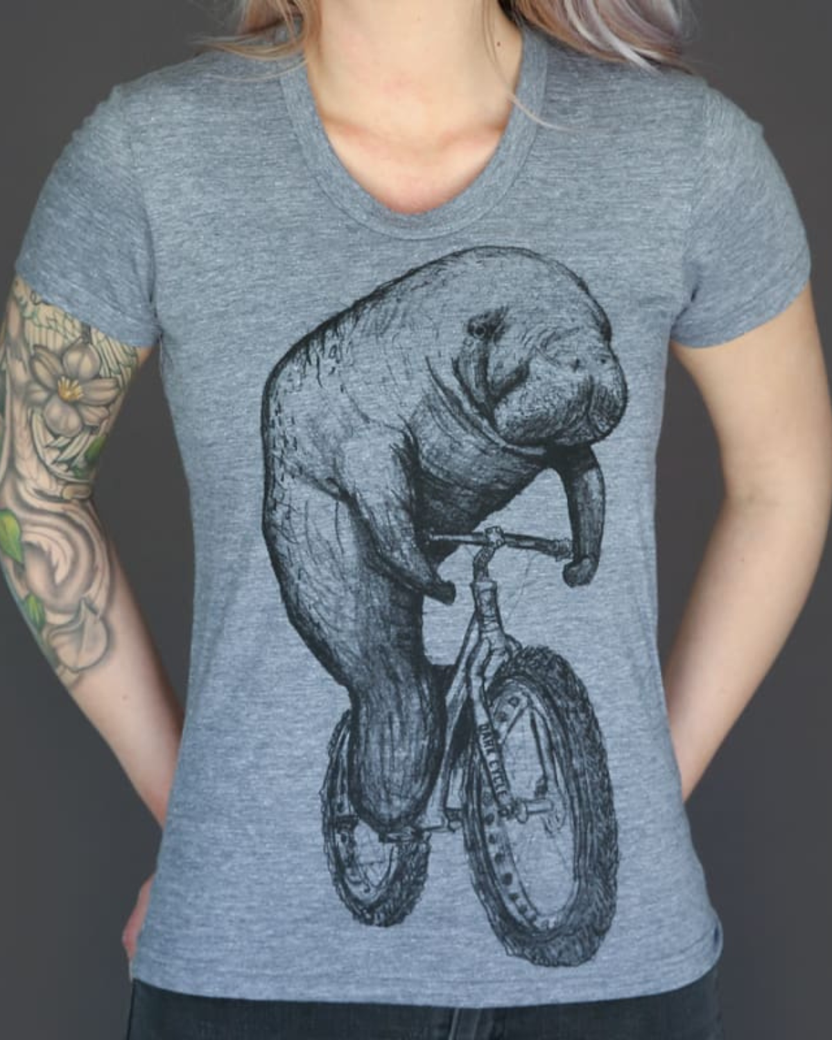 Manatee on a Bicycle Women’s T-Shirt - Ladies Tees