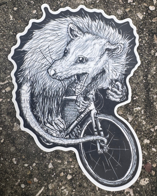 Opossum on a Bicycle Vinyl Sticker