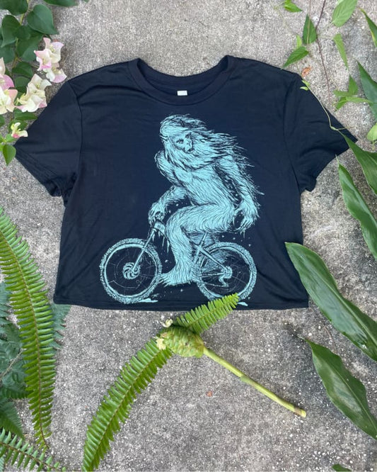 Yeti on a Bike- Women’s Black Crop Top - Ladies Tees