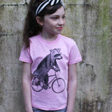Raccoon on a Bicycle Kids T-Shirt - Kids/Youth / Pink / 8 - Kids Shirts
