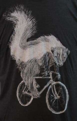 Skunk on a Bicycle Women’s Shirt - Ladies Tees